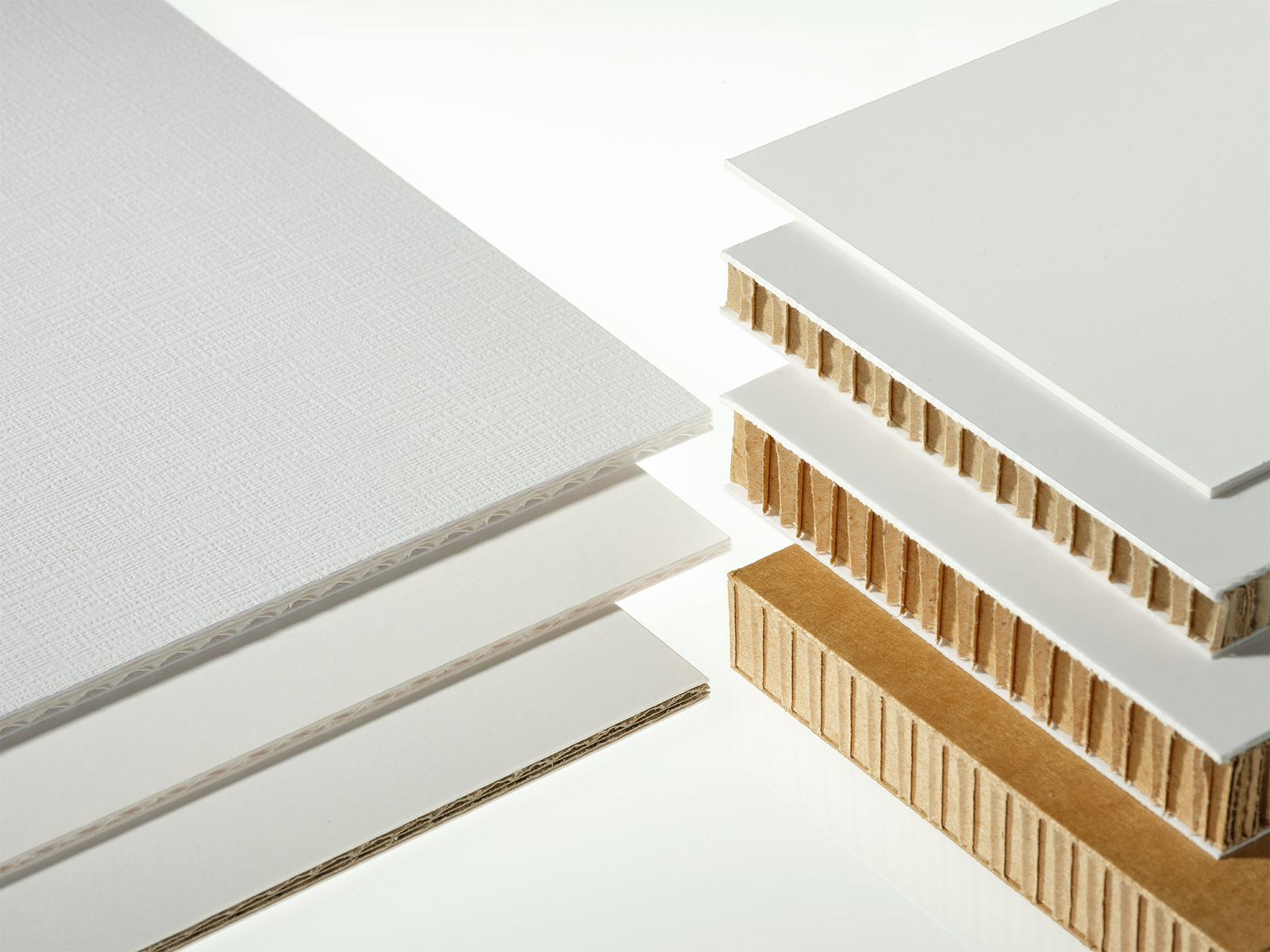 Tableros a base de papel y materiales compuestos